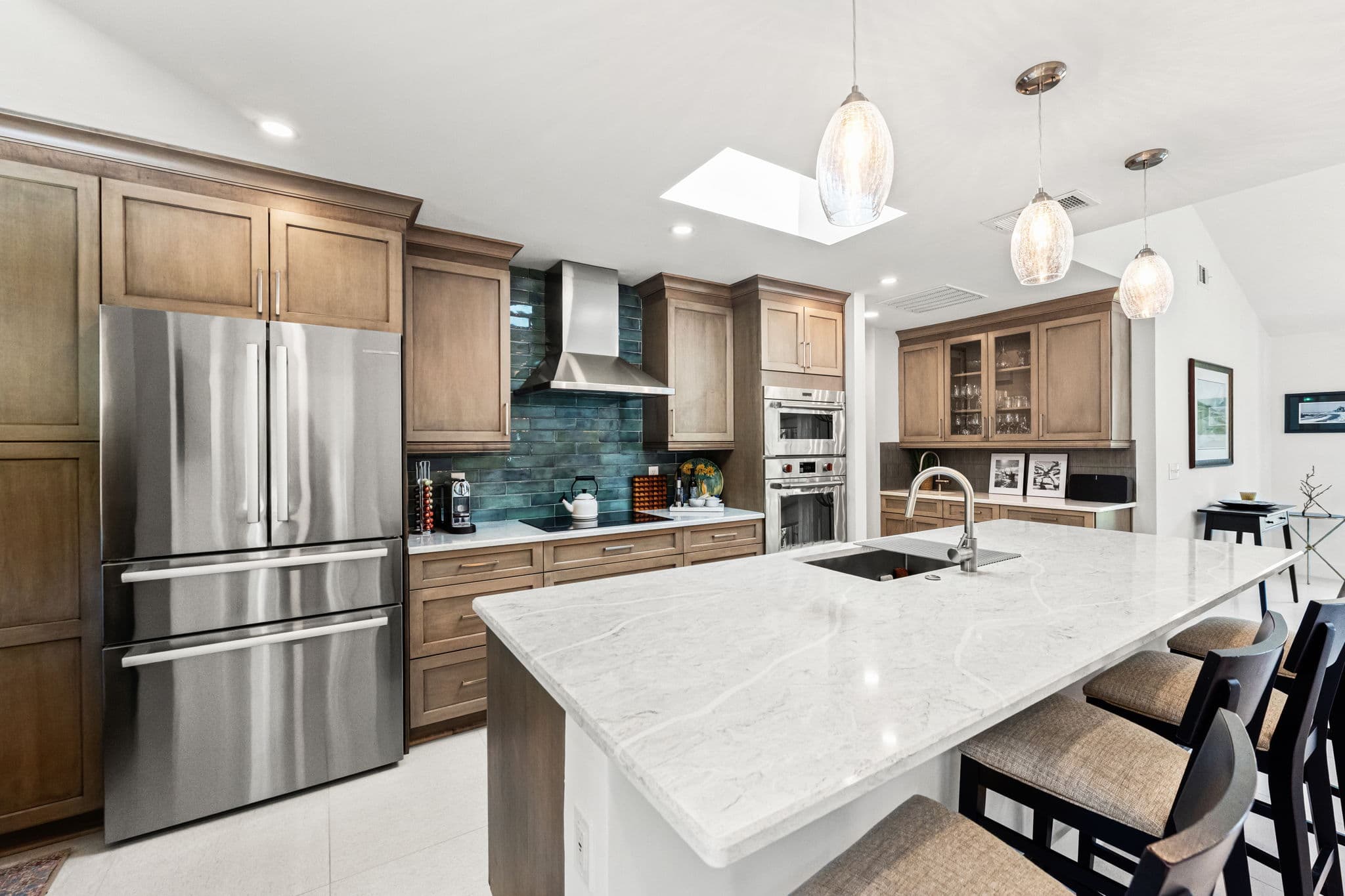 Kitchen remodel with a finished countertop and tile backsplash